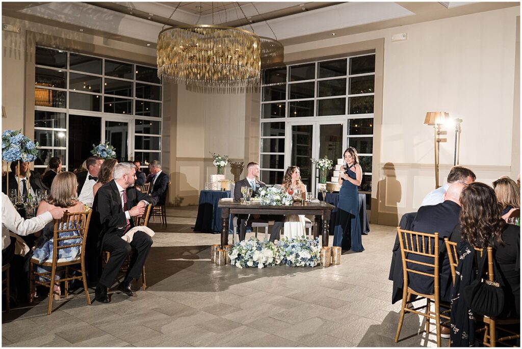Maid of honor giving her speech the Stone house at Stirling ridge
