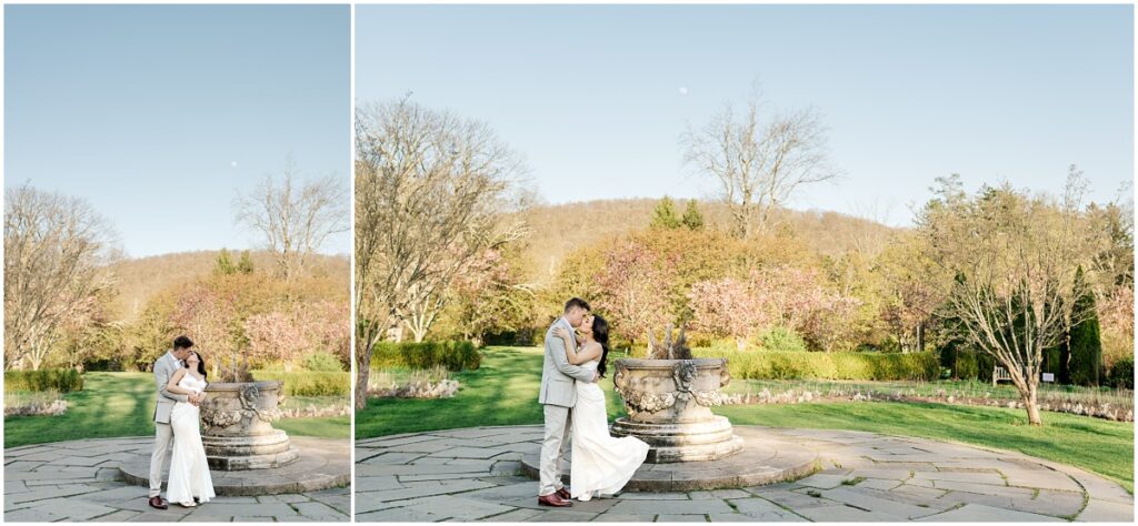 couple kissing at the italian Terrace at Skylands Manor