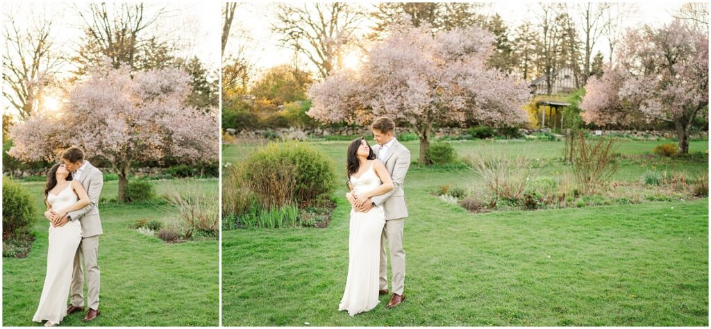 a couple looking at each other and kissing at the Skyland's Manor Crabapple Allée