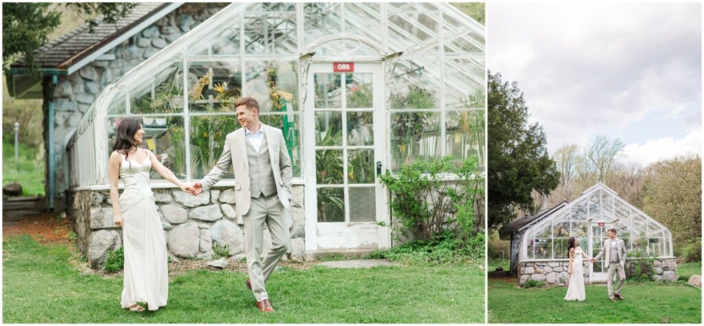 couple holding hands in front of greenhouse in the Skylands Manor